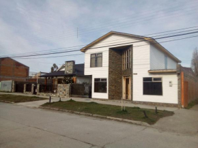 Отель Hostal Los Pioneros  Puerto Natales